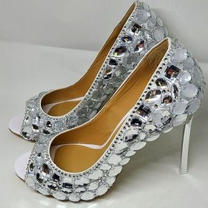 Brand new Stiletto pumps embellished with Crystals
